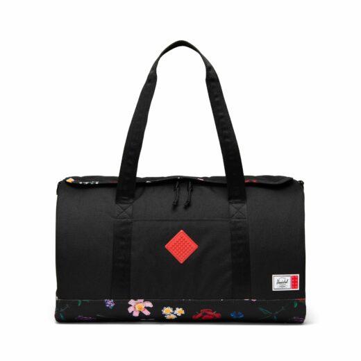Herschel Heritage weekendtas - zwart met dwarrelende bloemen